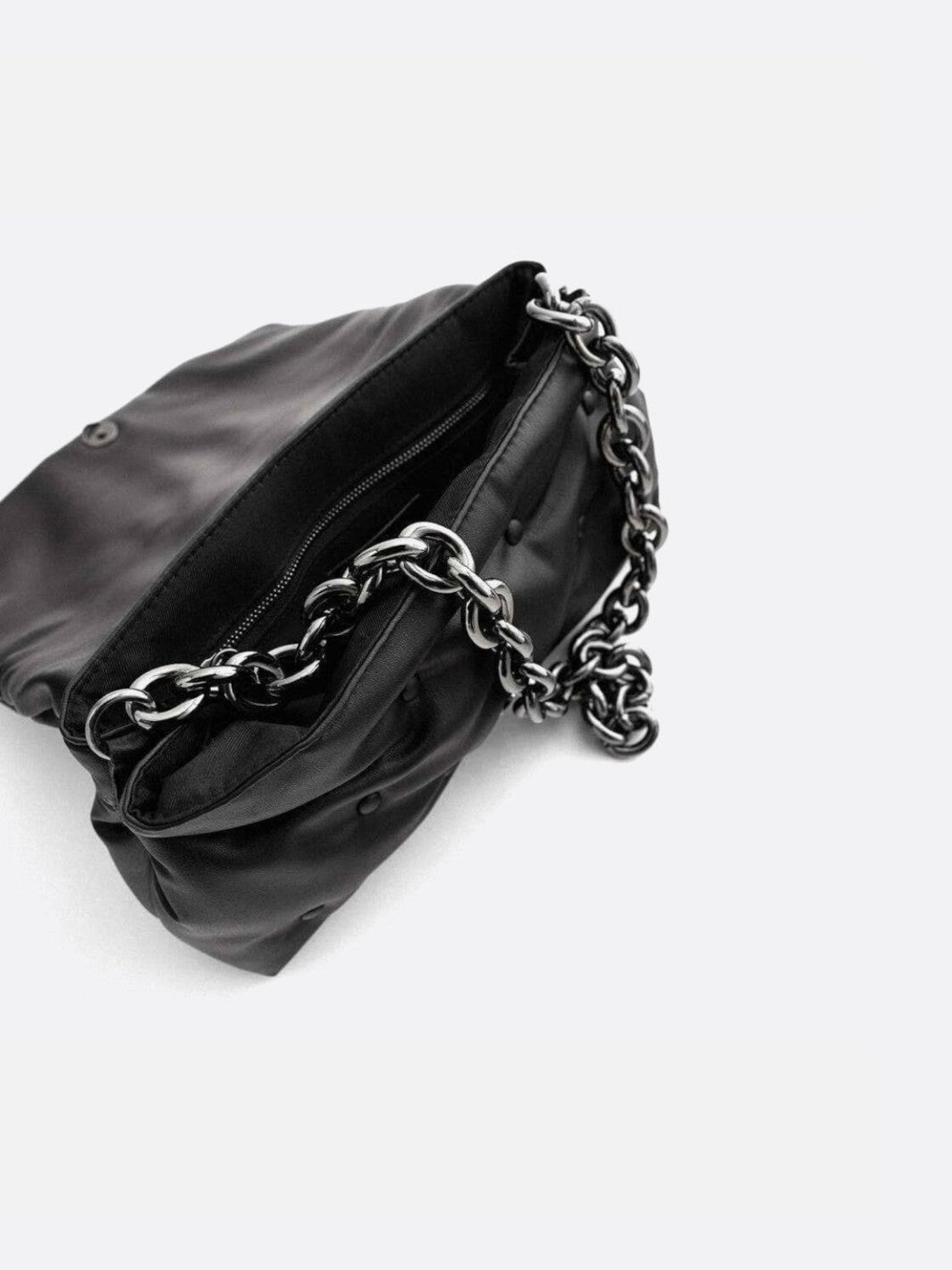Black quilted bag with chain shoulder strap